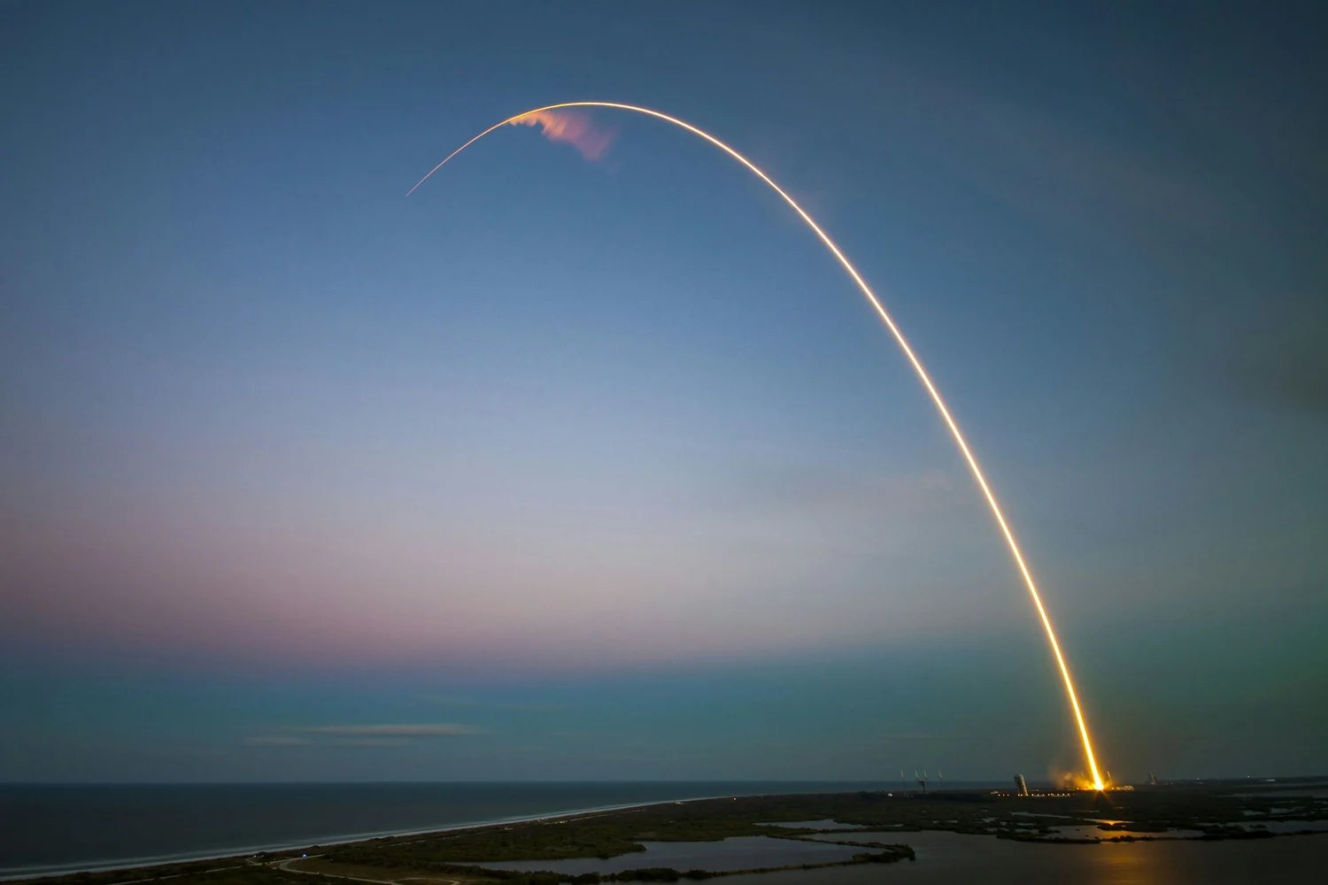 A rocket launch at dusk